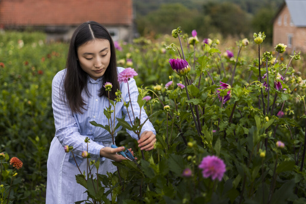 The current image has no alternative text. The file name is: front-view-woman-taking-care-plants-scaled.jpg